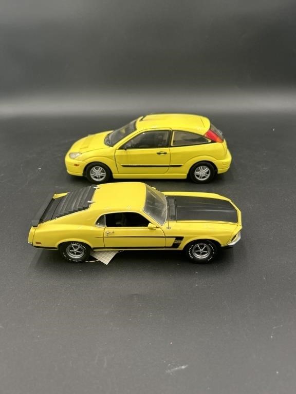 (2) Yellow 1:32 Scale Cars