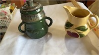 Iowa storm jar and Watt USA pottery small pitcher