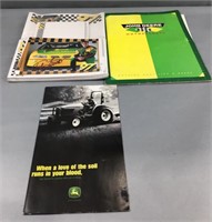 John Deere catalog, motorsports folder, and Chad