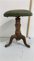 Wooden base, iron legged piano stool