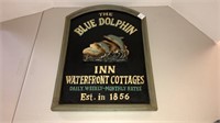 "The Blue Dolphin Inn Waterfront Cottages wall