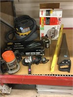 Tile cutter, wire spools, router and more. Tools.