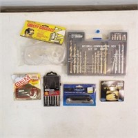 Drill bits, hex key set, screwdrivers, chuck key..