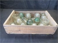 Wooden crate of glass insulators