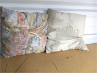 Two throw pillows leaves