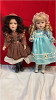 2 porcelain dolls/ brown plaid/aqua
