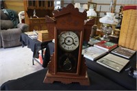 Oak Eastlake mantle clock with key patented 1881