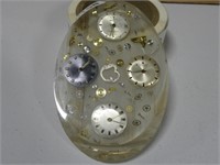 Vintage watches in Lucite wall hanging