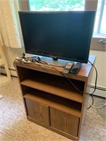 Small flatscreen TV w/ stand