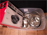 Tub of pots and pans, most new including three