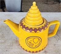 Unique yellow tea pot.