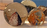 2 paperweights -
