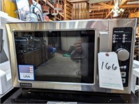 NEW AMANA S/S MICROWAVE OVEN (DENTED RT REAR)