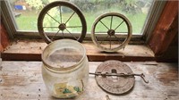 Antique bicycle wheels, a jar, and furnace damper