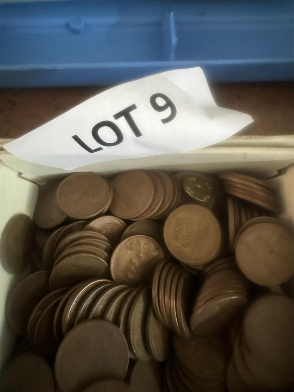 Box of wheat pennies, and regular pennies