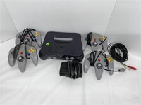 NINTENDO 64 GAMING CONSOLE WITH 4 CONTROLLERS &