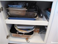 CABINET FULL OF CASEROLE DISHES, COOKING PANS ETC