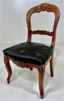 Walnut Victorian side chair, rose carved, horse