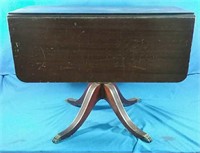 Antique drop leaf table nice claw feet with Lion