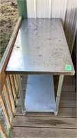 Metal Table
49 in L x 24 in D x 35 in T
