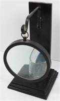 Cast iron style candle holder with magnifier
