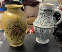 Cobalt blue glazed pitcher and floral pitcher