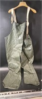 Pair of rubber fishing coveralls and a rubber ponc