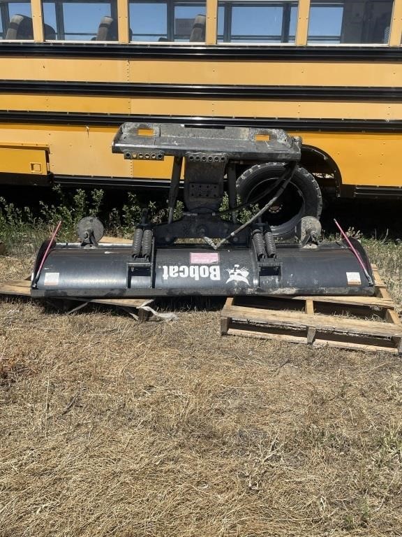 Plow attachment for skid steer