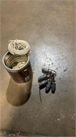 Can of cable and clamps