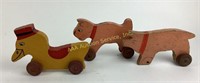 Wooden pull toys:  pig, duck and cat.  Missing