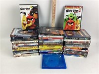 DVDs Curious George, Chicken Little, Young Guns,