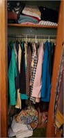 Contents of closet mostly women's clothing