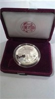 1993 silver dollar marked 1 Oz. Fine silver