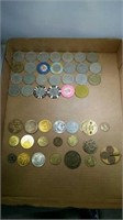 Several Casino tokens and miscellaneous