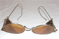 Vintage pair of safety goggles.