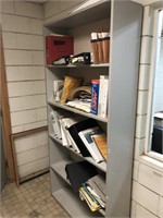 Wooden Storage Shelf with Machine Manuals