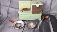 Vintage toy electric stove from 1949 with kids
