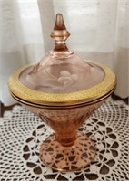 Pink depression glass lidded candy dish, gold