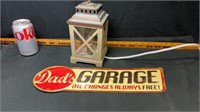 Lamp and dads garage sign