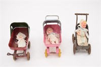 Three Toy Baby Strollers