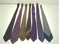 Seven designer mens neckties. Chanel, Yves Saint