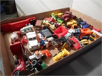Group of construction pieces and trucks