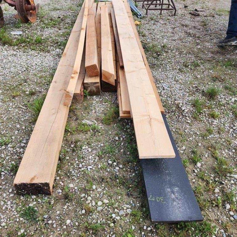 Various size & length unused lumber pile
