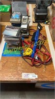 CDs, jumper cables, tools