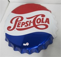 Tin Pepsi Cola button. Measures 18" D.