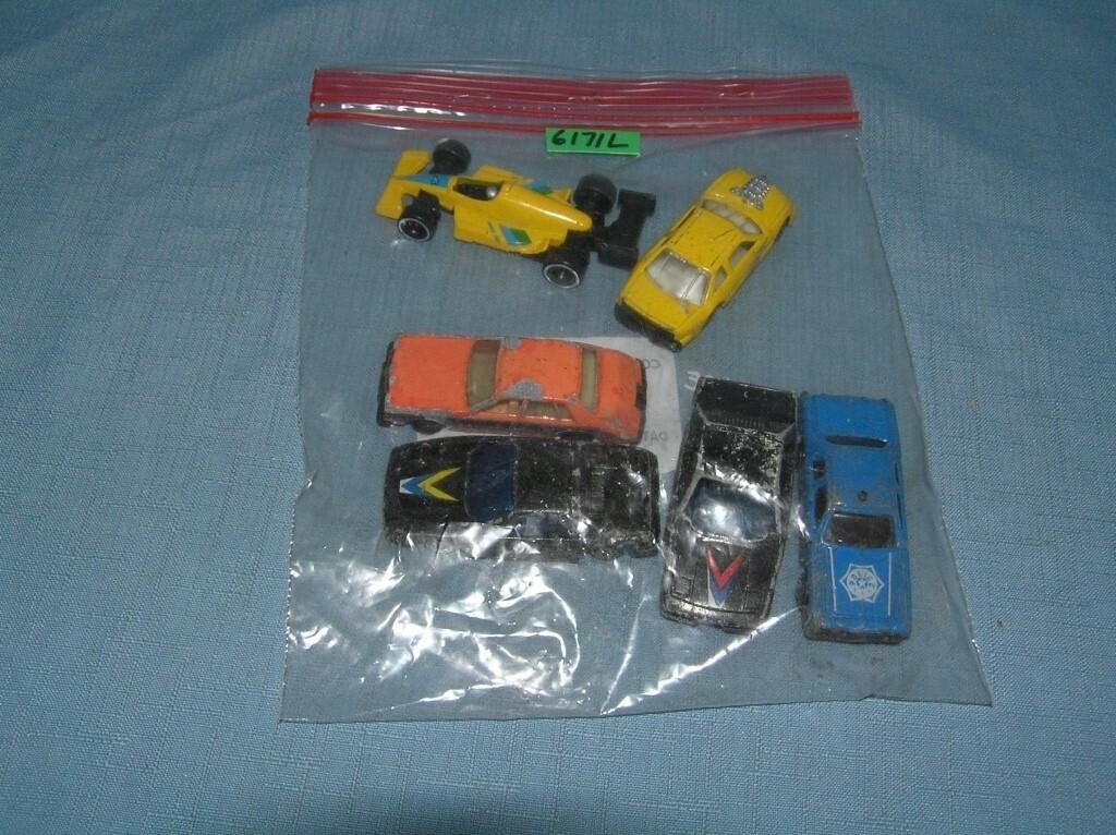 Bag lot of vintage die cast vehicles