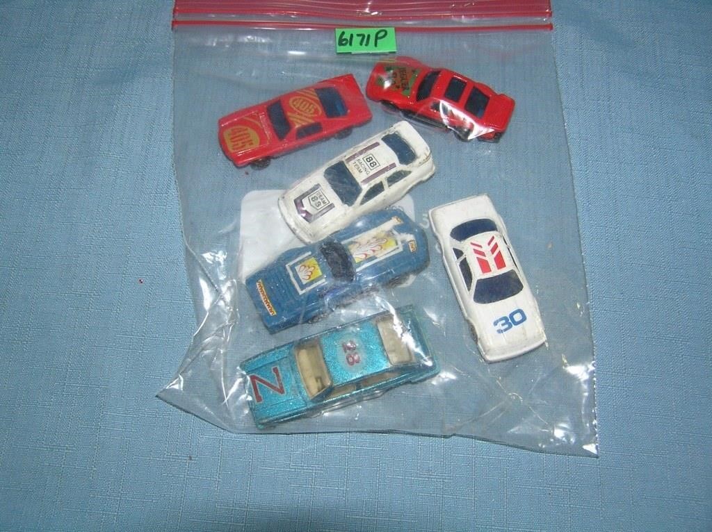 Bag lot of vintage die cast vehicles