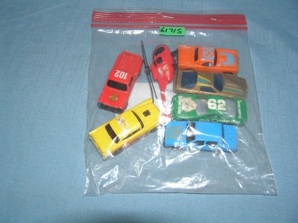 Bag lot of vintage die cast vehicles