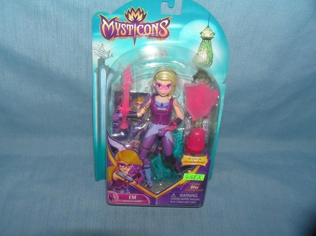 Mysticon's Em action figure mint on card