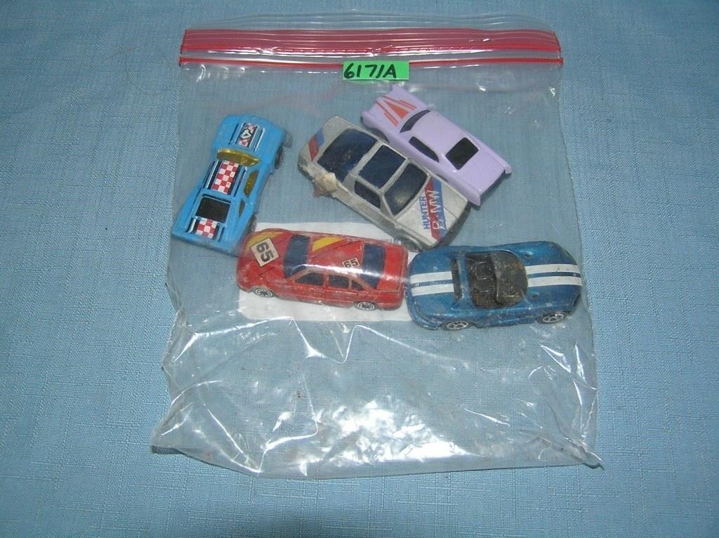 Bag lot of vintage die cast vehicles